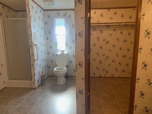890 Bell Road Watertown, TN 37184 - Photo 27 of 62 a bathroom with a shower and a toilet