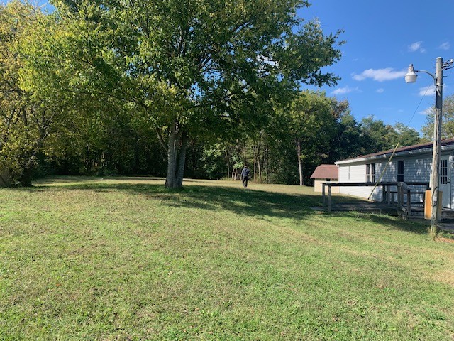 890 Bell Road Watertown, TN 37184 - Photo 43 of 62 a backyard of a house with lots of green space