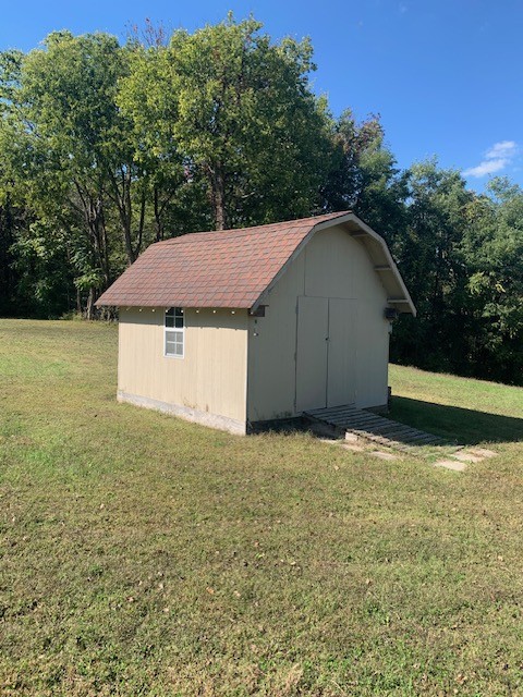 890 Bell Road Watertown, TN 37184 - Photo 7 of 62 a house with a yard