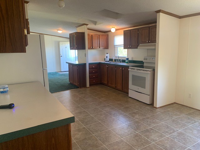 890 Bell Road Watertown, TN 37184 - Photo 10 of 62 a kitchen with stainless steel appliances a refrigerator sink and microwave
