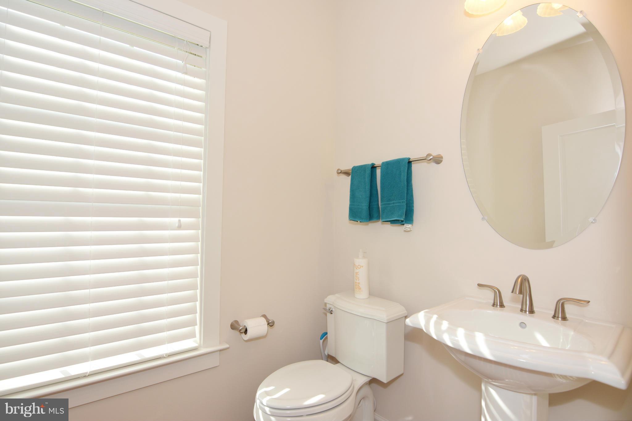 7403 Matapan Drive Hanover, MD 21076 - Photo 11 of 37 Convenient half bath off great room
