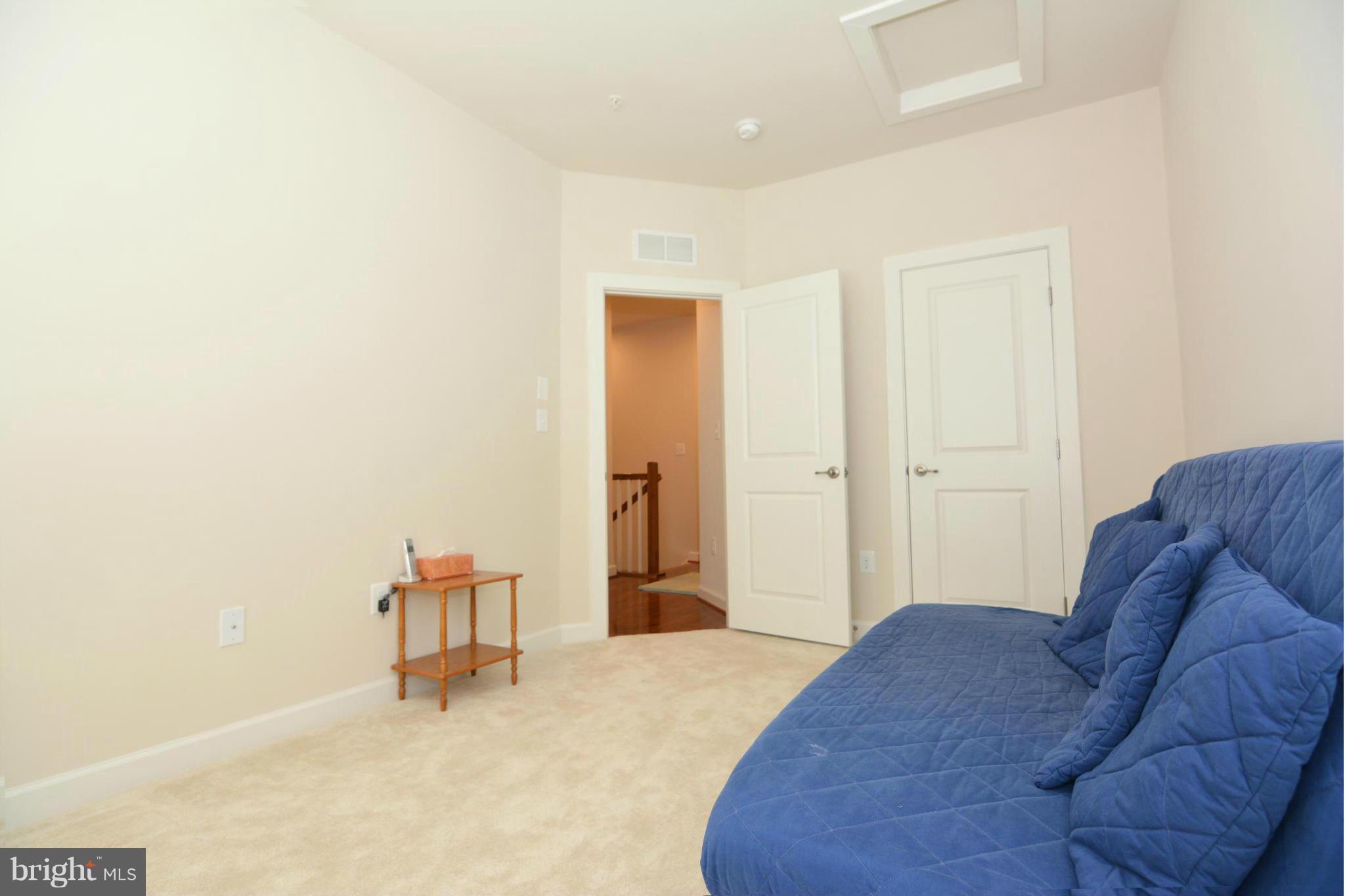 7403 Matapan Drive Hanover, MD 21076 - Photo 15 of 37 Spacious guest bedroom