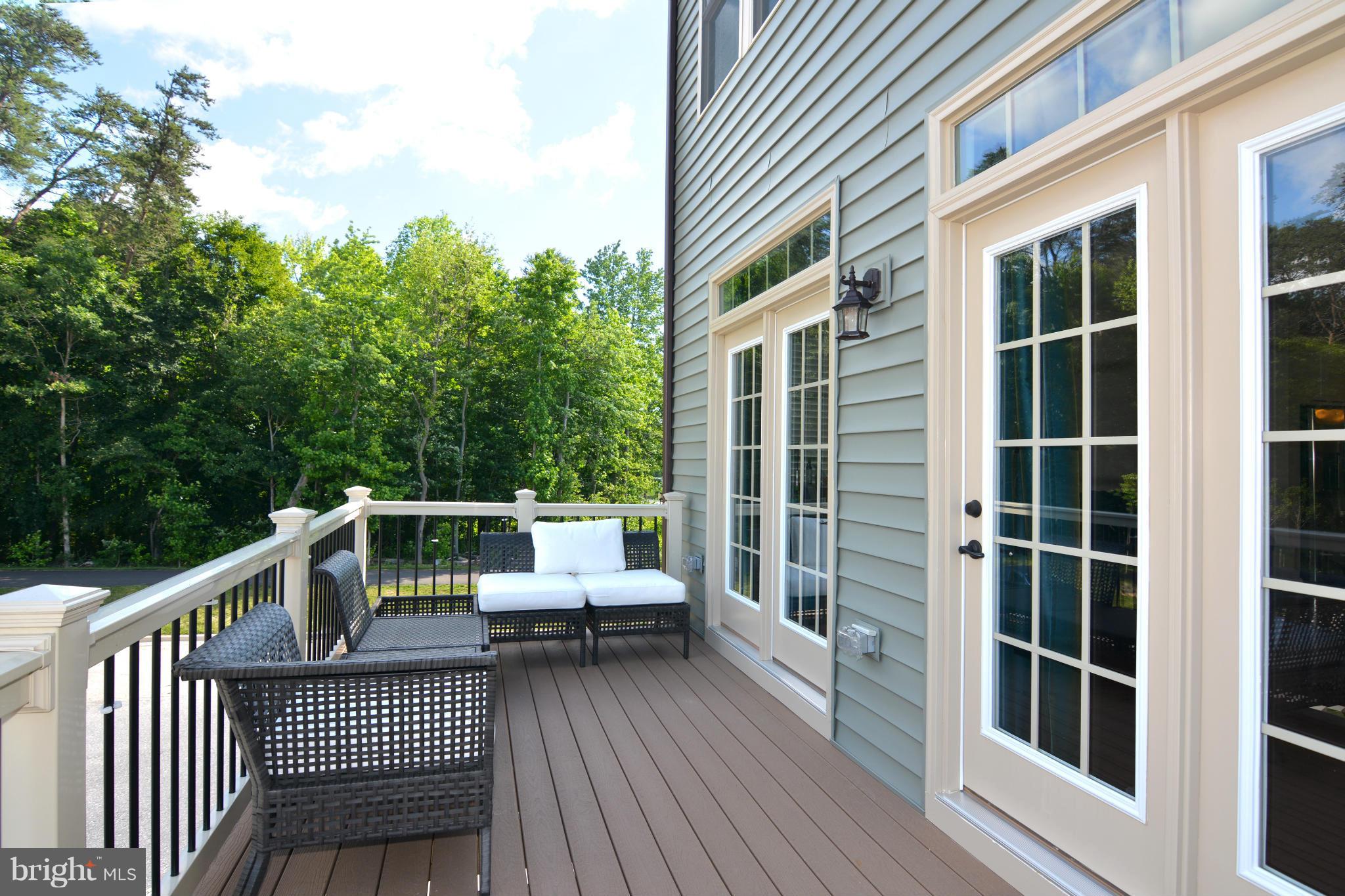 7403 Matapan Drive Hanover, MD 21076 - Photo 3 of 37 Enjoy the great outdoors for dining and relaxing.