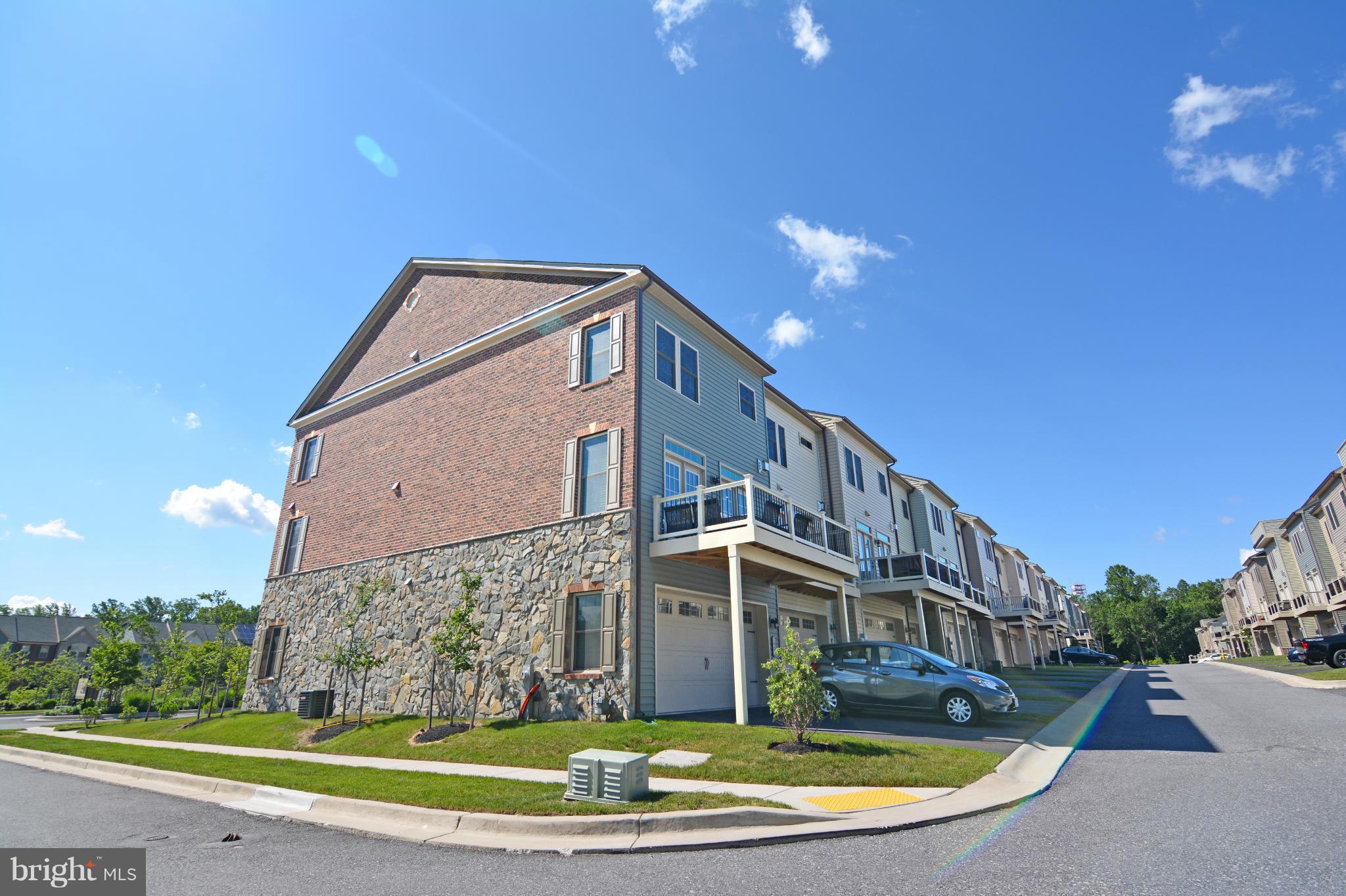 7403 Matapan Drive Hanover, MD 21076 - Photo 27 of 37 Architectural details with stone and brick