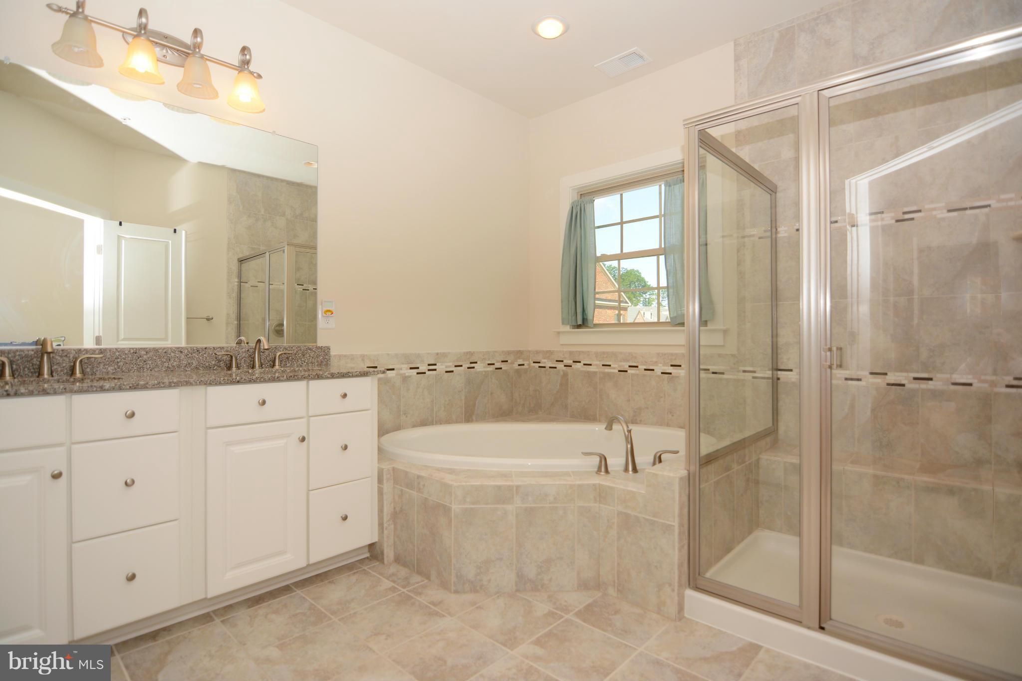 7403 Matapan Drive Hanover, MD 21076 - Photo 6 of 37 Spa-like master bath retreat