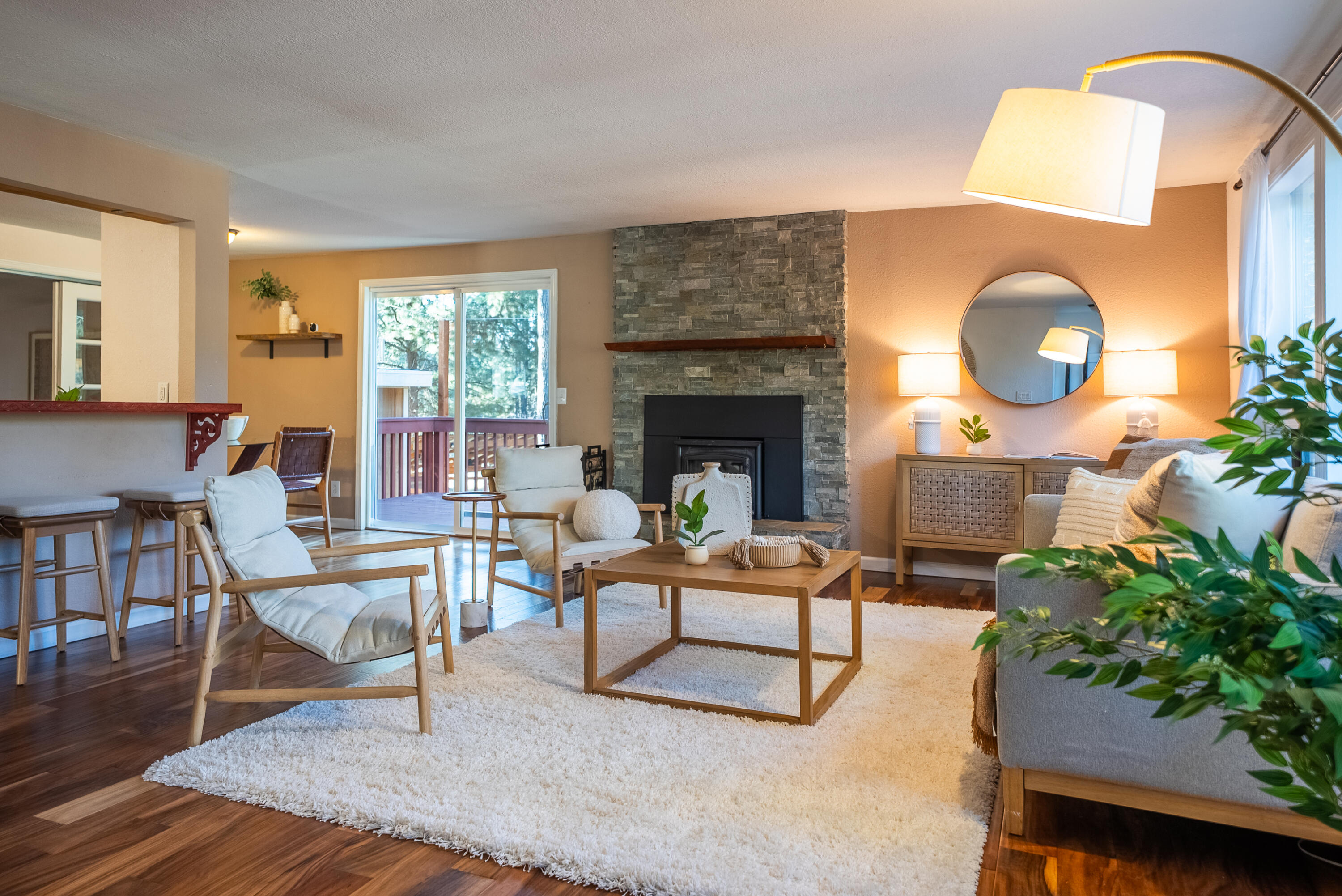 16879 Elsinore Road Bend, OR 97707 - Photo 3 of 48 a living room with furniture and a fireplace