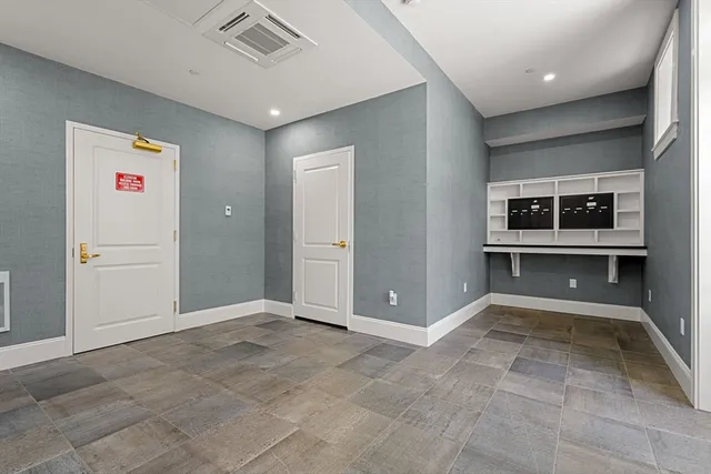 an empty room with windows