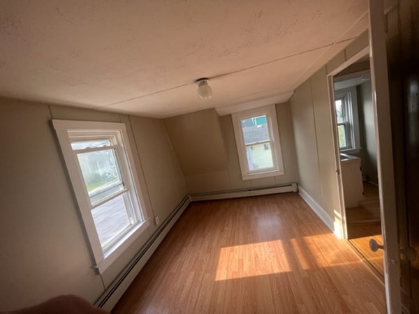 76 Squanto Road Weymouth, MA 02191 - Photo 19 of 22 a view of entryway with window and wooden floor