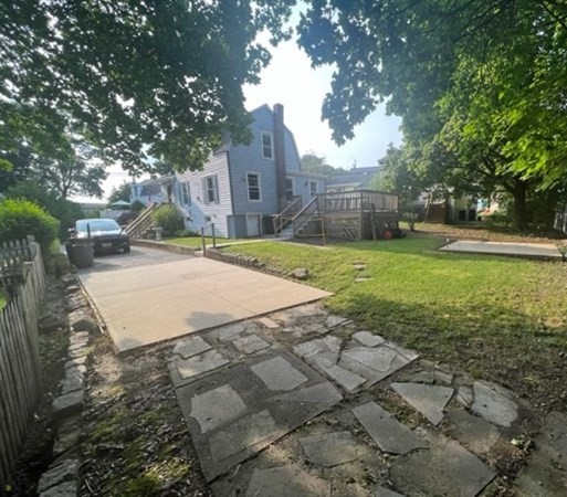 76 Squanto Road Weymouth, MA 02191 - Photo 3 of 22 a view of yard with swimming pool and seating space