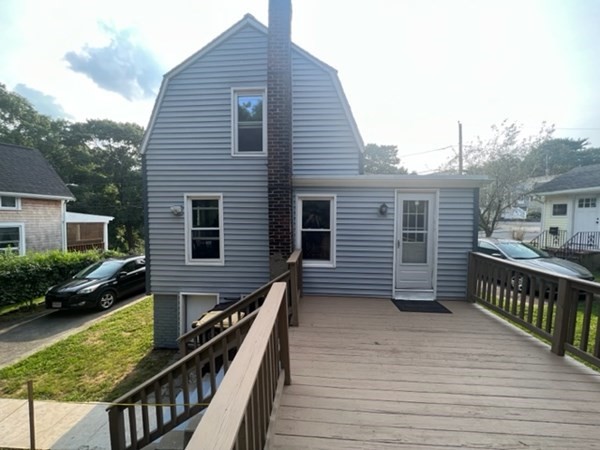76 Squanto Road Weymouth, MA 02191 - Photo 5 of 22 a balcony view with a seating space