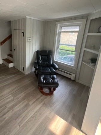 76 Squanto Road Weymouth, MA 02191 - Photo 9 of 22 a room with wooden floor and a window