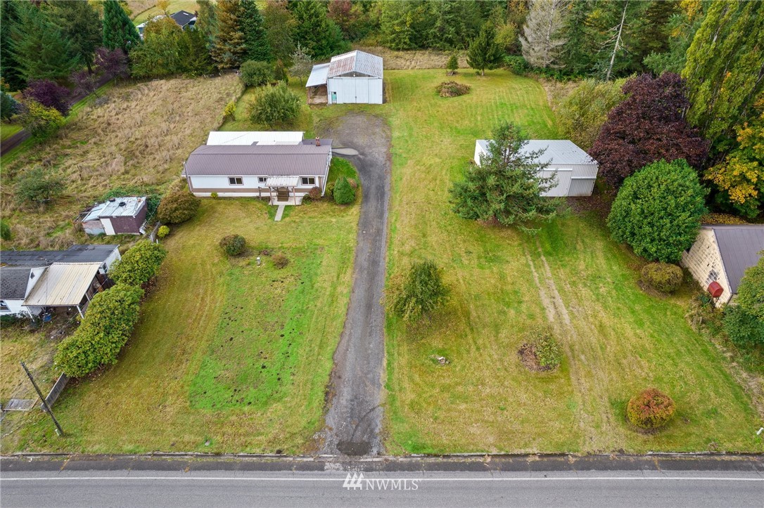 253 Stowell Road Salkum, WA 98582 - Photo 2 of 31 an aerial view of a house with a yard basket ball court and outdoor seating