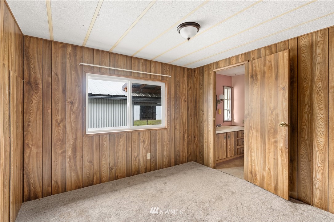 253 Stowell Road Salkum, WA 98582 - Photo 13 of 31 a view of an empty room with a window
