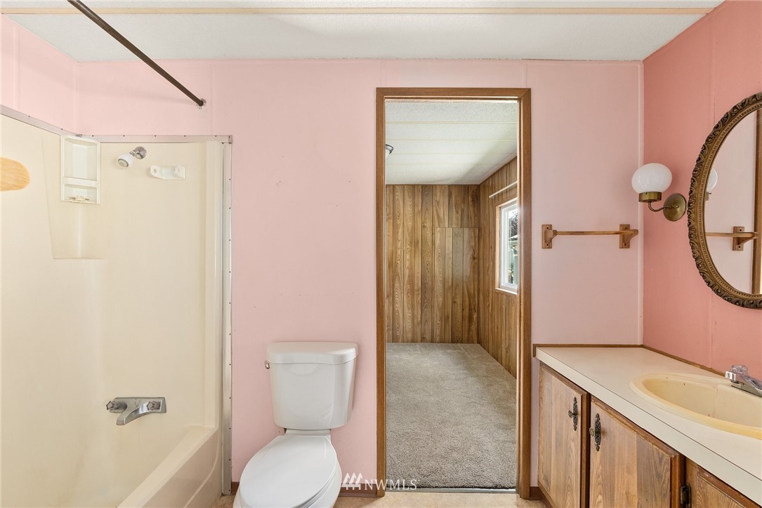 253 Stowell Road Salkum, WA 98582 - Photo 14 of 31 a bathroom with a sink a toilet and shower