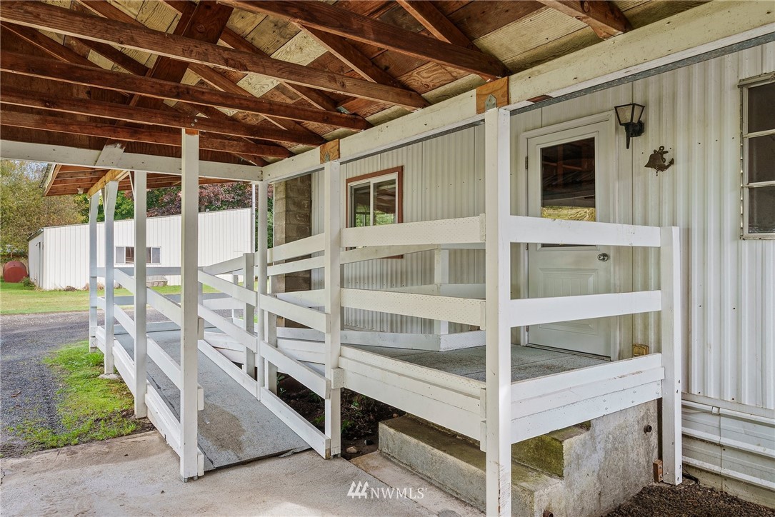 253 Stowell Road Salkum, WA 98582 - Photo 21 of 31 a view of a balcony with a window and stairs