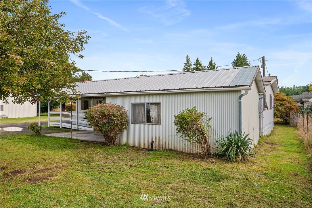 253 Stowell Road Salkum, WA 98582 - Photo 24 of 31 a view of a house with a garden