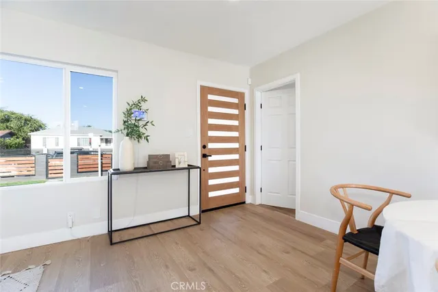 a room with furniture and wooden floor