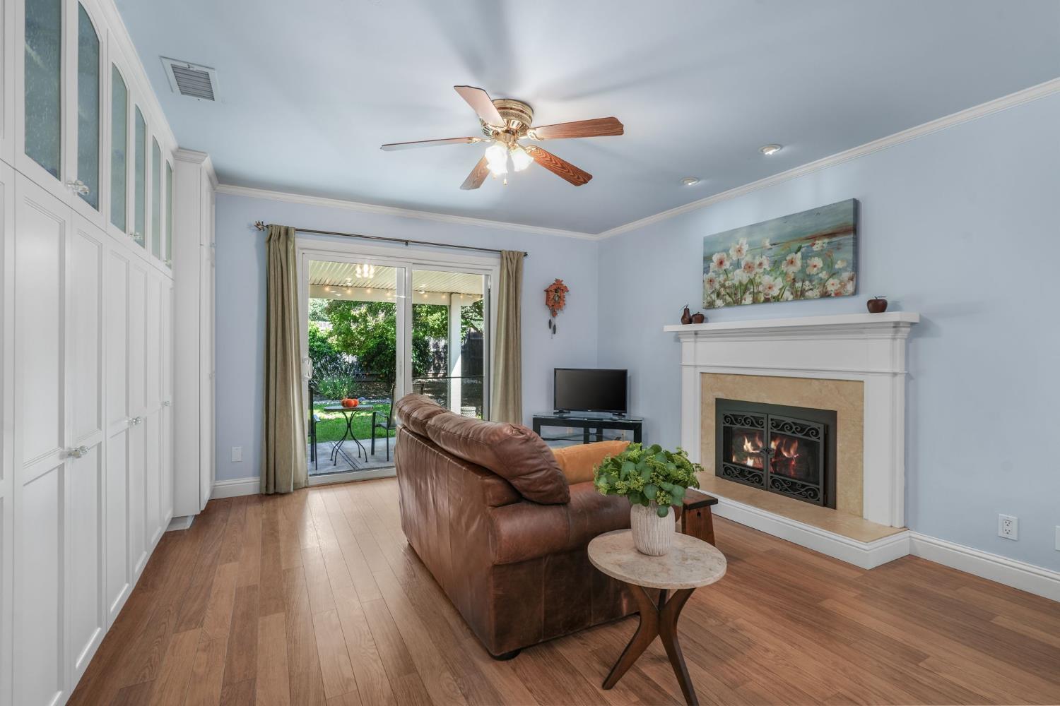 2276 El Cejo Circle Rancho Cordova, CA 95670 - Photo 14 of 41 The fireplace offers an appealing visual focal in spring and summer, and cozy warmth in cooler weather! (Fire is digitally added.)