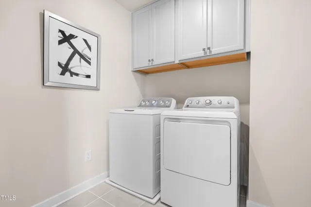 a bathroom with a sink a toilet a mirror a bathtub and shower