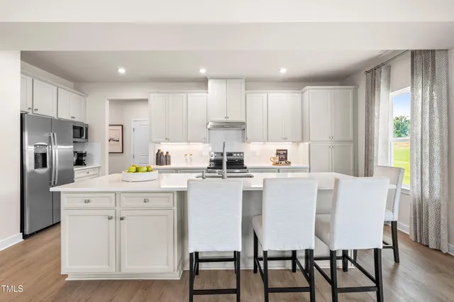 a black and white photo of a living room