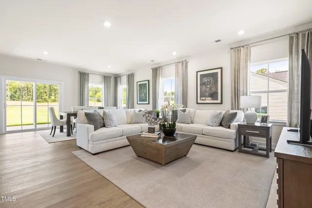 a living room with furniture and a couch