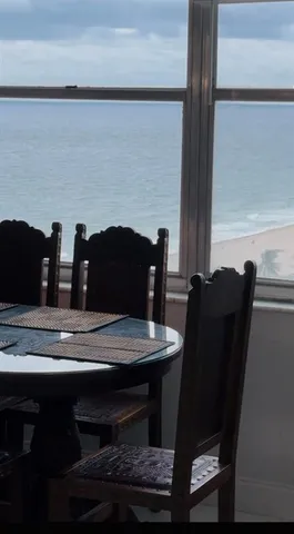 a dining table with a fireplace