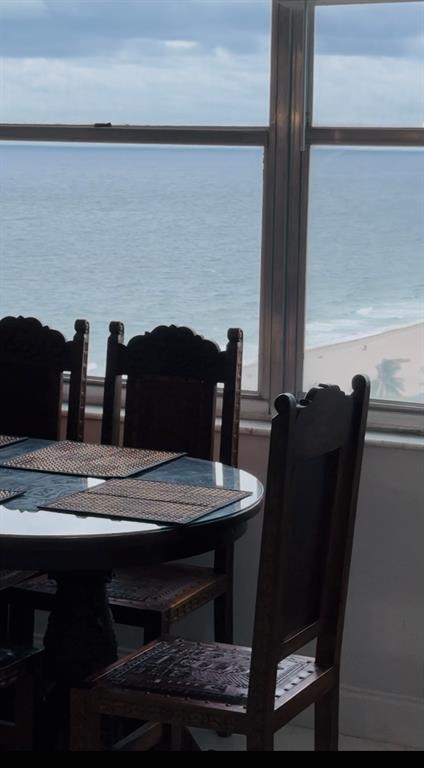 111 Briny Avenue, Unit 2008 Pompano Beach, FL 33062 - Photo 13 of 50 a dining table with a fireplace