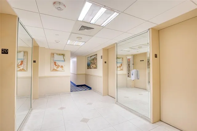 a spacious bathroom with a tub shower and sink