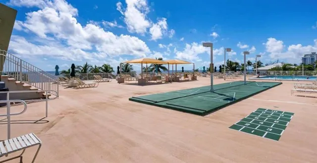 a view of a street with a houses