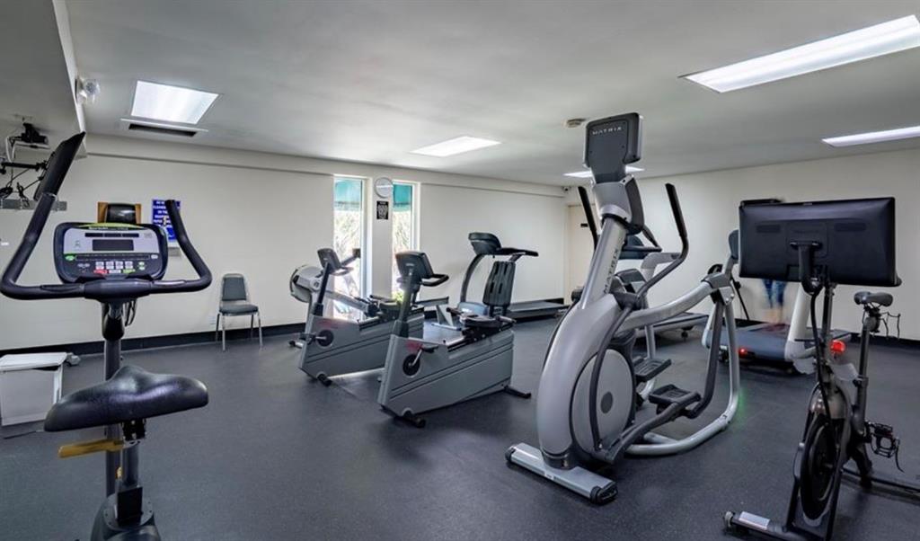 111 Briny Avenue, Unit 2008 Pompano Beach, FL 33062 - Photo 41 of 50 a view of a room with gym equipment