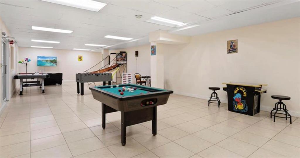 111 Briny Avenue, Unit 2008 Pompano Beach, FL 33062 - Photo 46 of 50 a living room with furniture