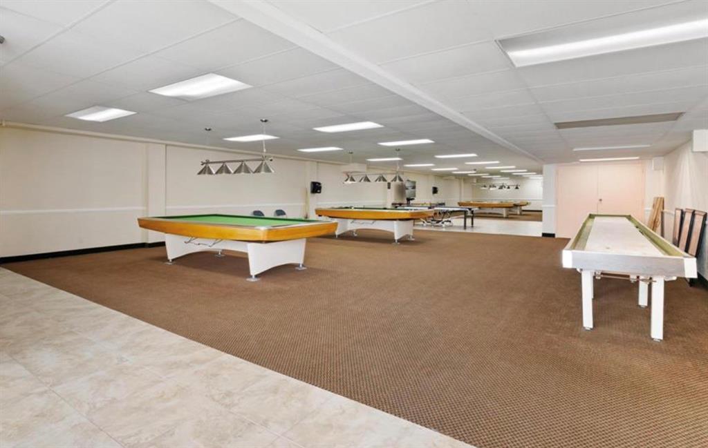 111 Briny Avenue, Unit 2008 Pompano Beach, FL 33062 - Photo 47 of 50 a outdoor space with furniture and a kitchen