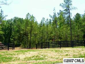 Lot B Lot B Sutton Springs Road York, SC 29745 - Photo 3 of 8 a view of backyard with wooden fence