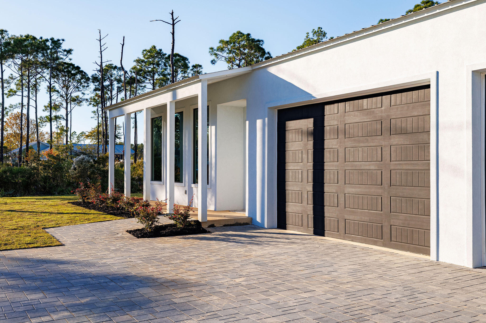 32 Delbert Lane, Unit B Santa Rosa Beach, FL 32459 - Photo 12 of 13 a view of a house with a yard and tree