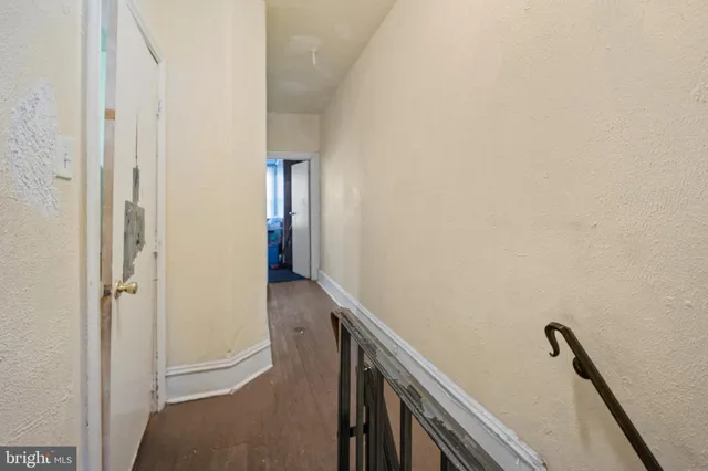 a view of a hallway with workspace