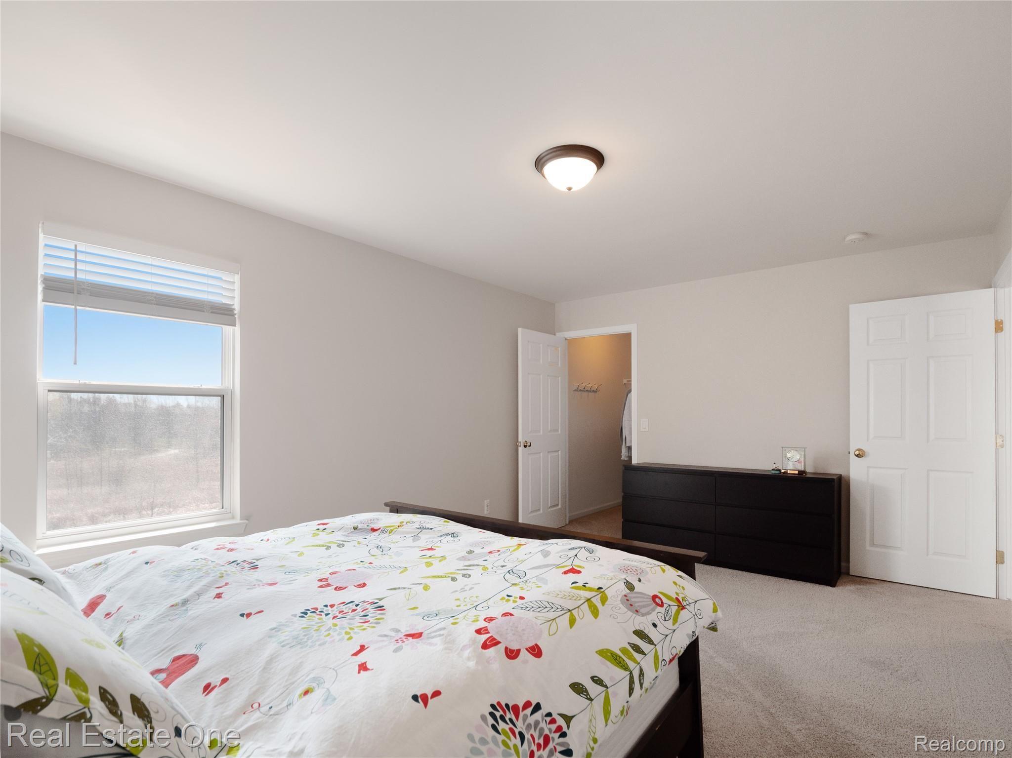 3597 Everett Drive Rochester, MI 48307 - Photo 38 of 57 Bedroom 3 with Walk In Closet and Great View of Pond & Nature Preserve.jpg