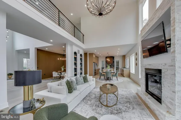 a bathroom with a tub sink mirror and a shower