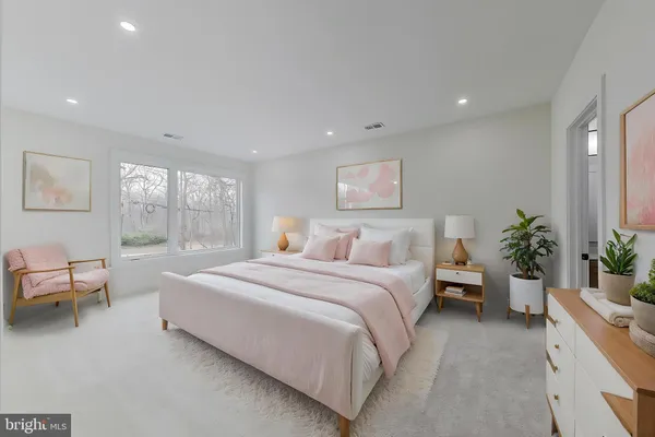 a bathroom with a shower and a bath tub