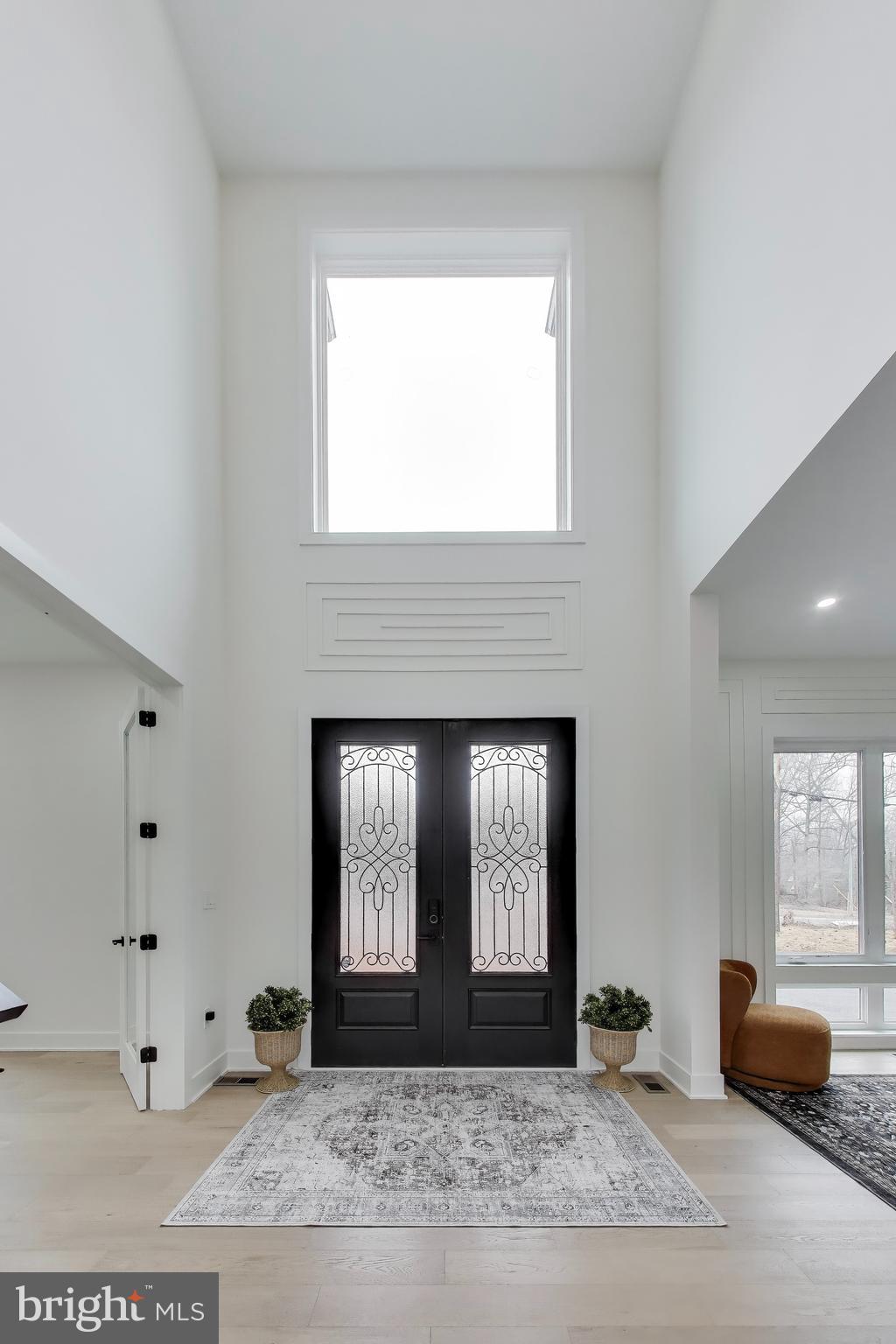 6634 Davis Ford Road Manassas, VA 20111 - Photo 5 of 120 a view of livingroom with furniture and windows