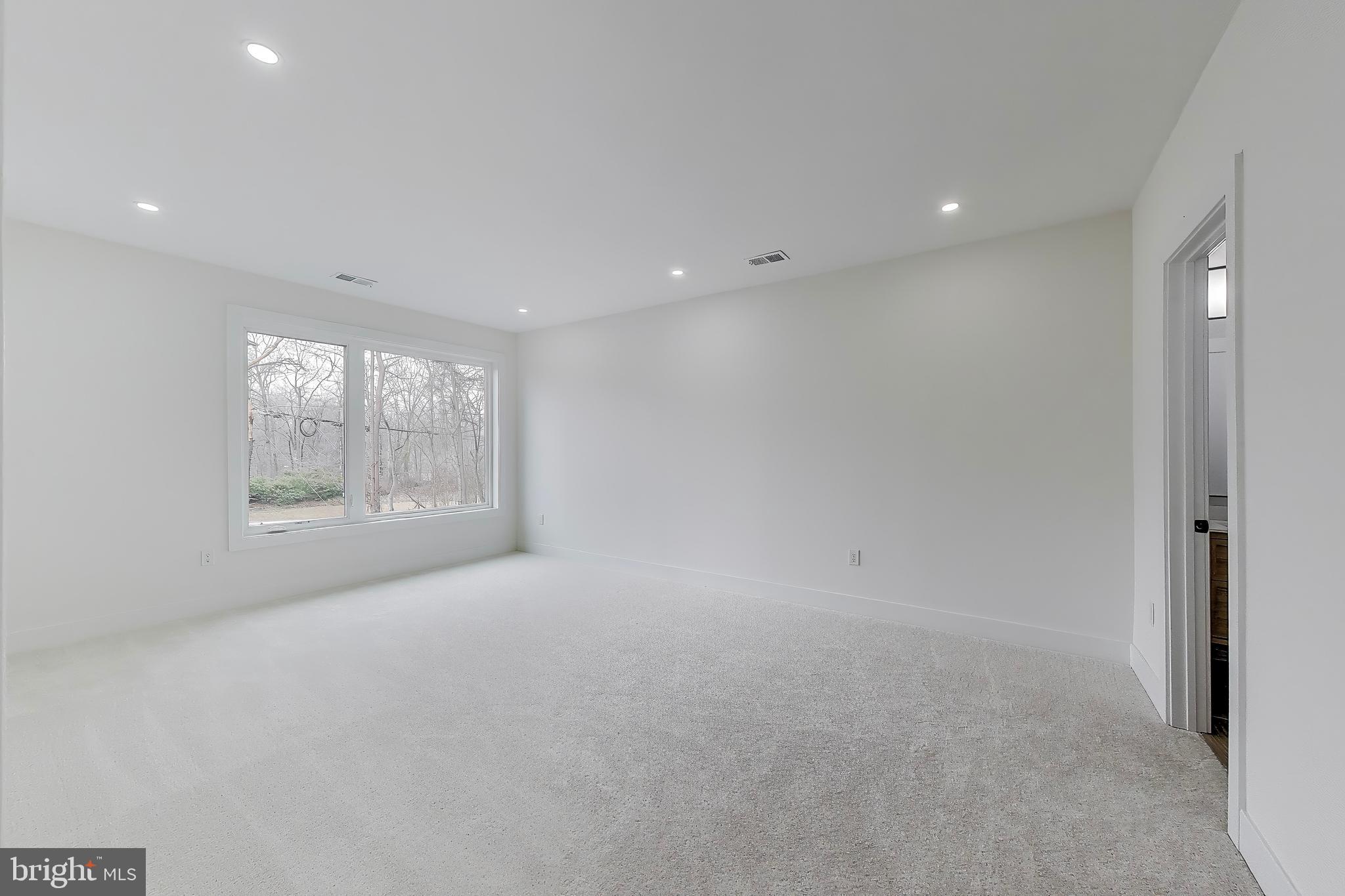 6634 Davis Ford Road Manassas, VA 20111 - Photo 55 of 120 a view of an empty room with a window