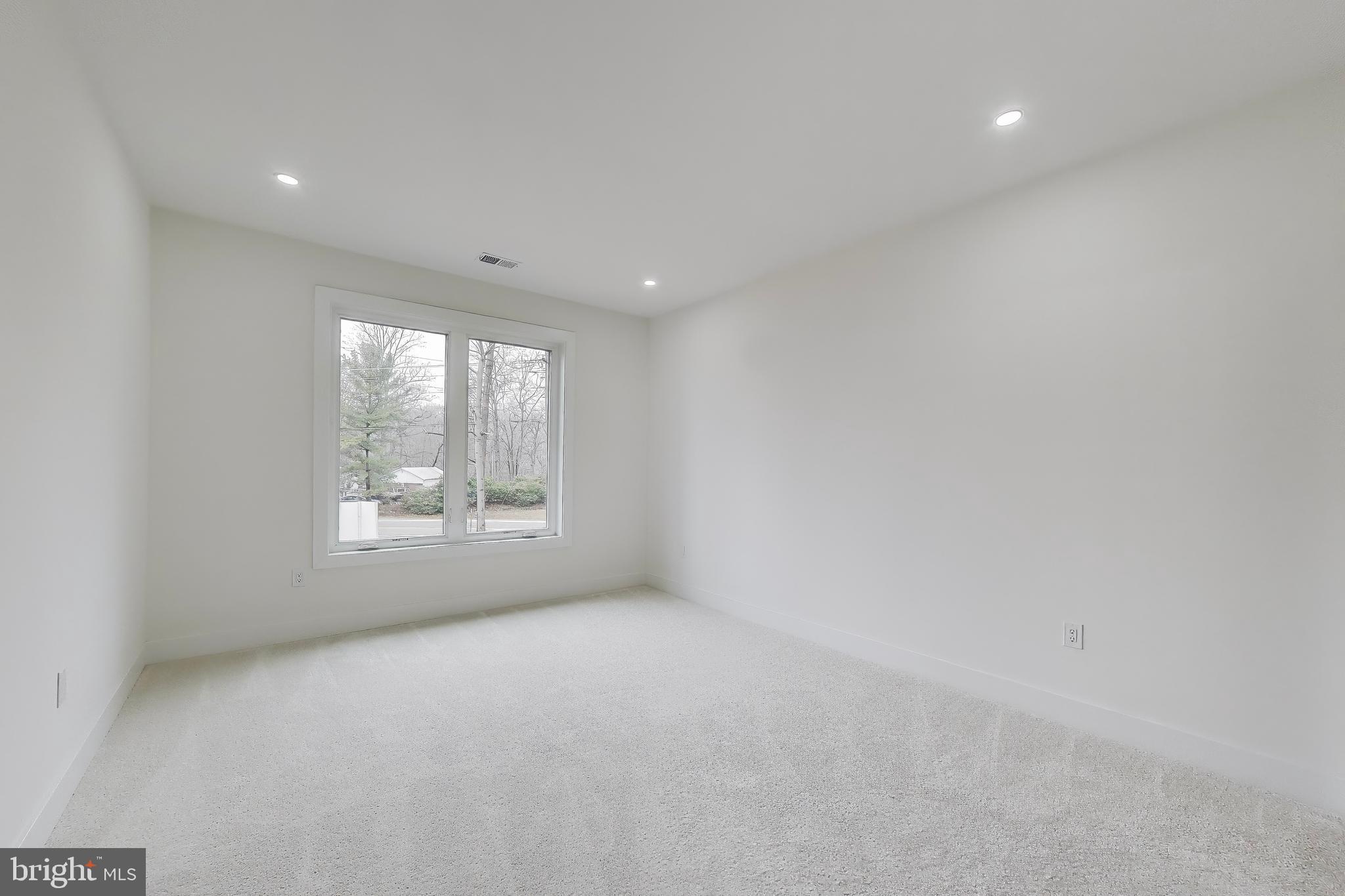 6634 Davis Ford Road Manassas, VA 20111 - Photo 69 of 120 a view of an empty room with a window