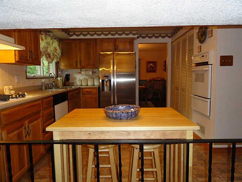 159 Ridgewood Road Pittsburgh, PA 15237 - Photo 16 of 25 Kitchen. This is the view from the Family room. This layout is great for the more open feel with the Kitchen and Family Room areas