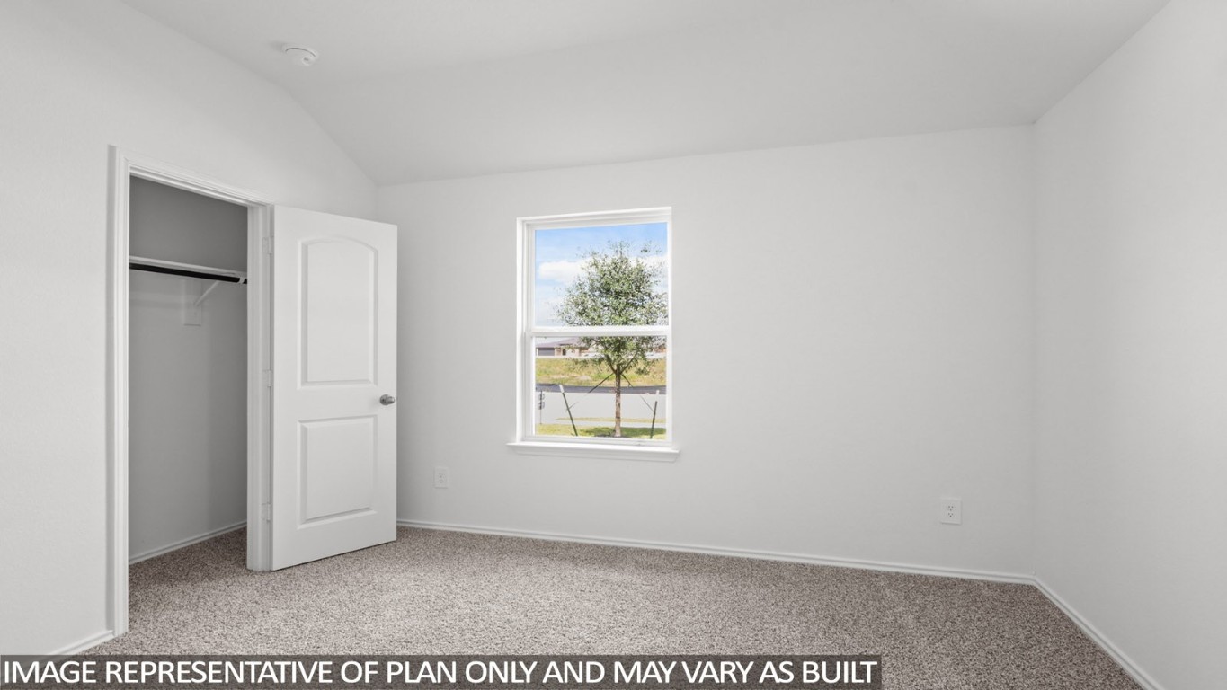 4408 Ledge Court Conroe, TX 77303 - Photo 11 of 26 an empty room with windows