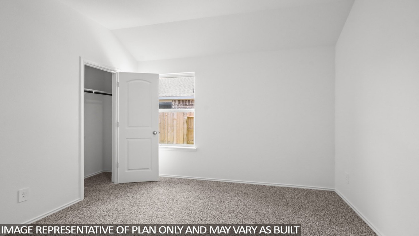 4408 Ledge Court Conroe, TX 77303 - Photo 12 of 26 a view of an empty room with window