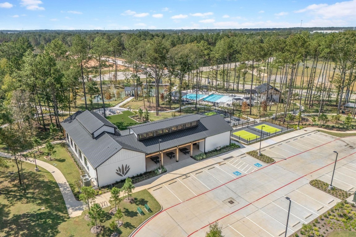 4408 Ledge Court Conroe, TX 77303 - Photo 23 of 26 a view of a city from a terrace
