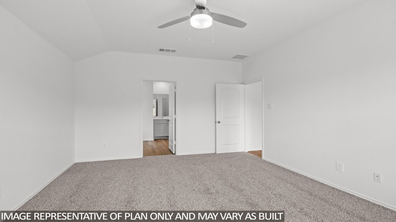 4408 Ledge Court Conroe, TX 77303 - Photo 7 of 26 a view of empty room with wooden floor