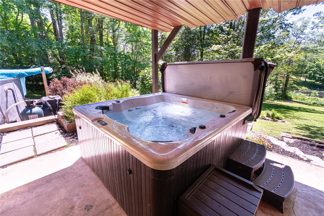 7733 East Port Bay Road Wolcott, NY 14590 - Photo 13 of 49 Hot tub- pool- over 3 acres- why ever leave home!?