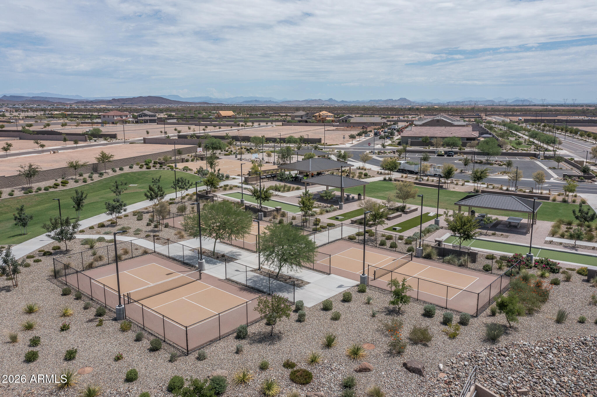 15767 West Sand Hills Road Surprise, AZ 85387 - Photo 30 of 45 an aerial view of a house with a mountain