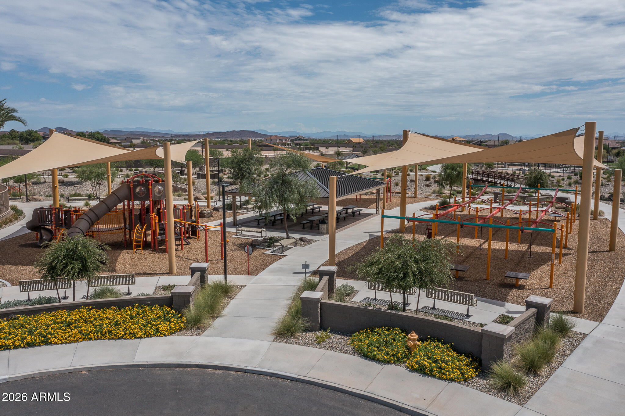 15767 West Sand Hills Road Surprise, AZ 85387 - Photo 35 of 45 a view of a swimming pool with a patio and a yard