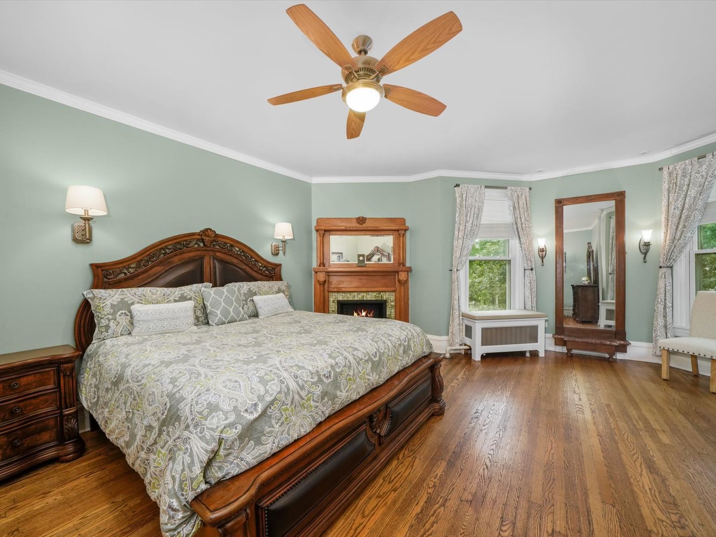 140 Lawton Road Riverside, IL 60546 - Photo 12 of 25 a bedroom with a bed and large windows